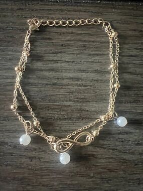 Gold Infinity Charm Bracelet with White Bead Drops